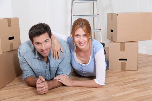 Local moving team handling boxes and household items
