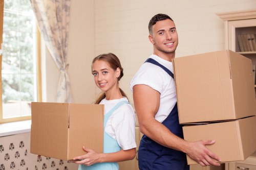 Packed boxes and furniture ready for man with van removal in Edenpark