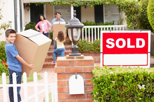 Movers handling furniture in an Edenpark property with care